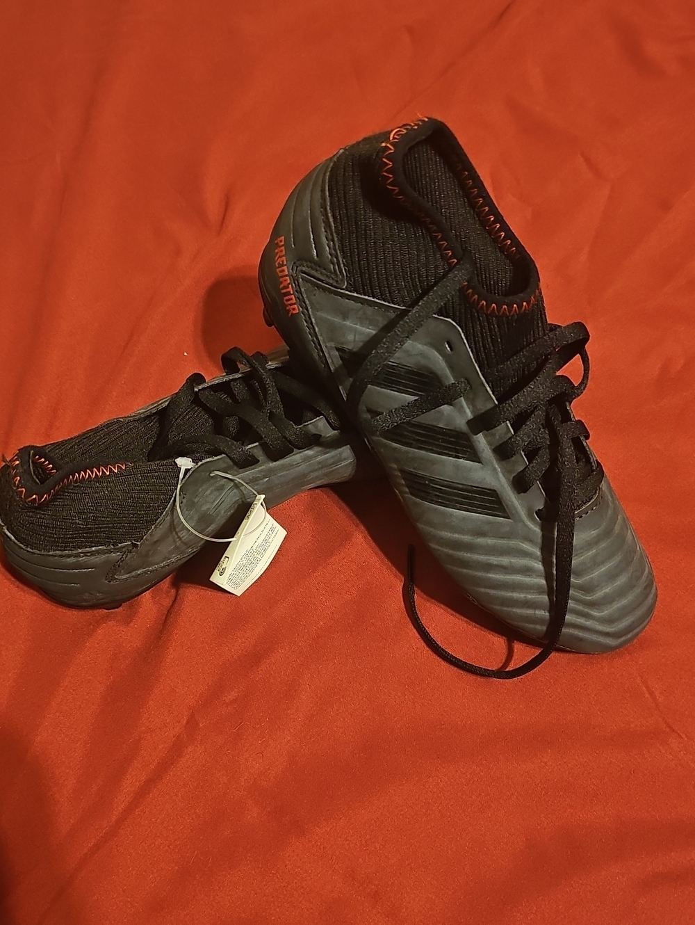 adidas Black Indoor Soccer Shoes with Red-Orange Stitching